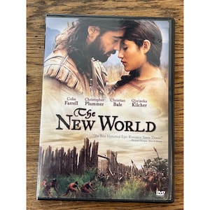 May include: DVD of the film "The New World" featuring Colin Farrell, Christopher Plummer, Christian Bale, and Q'orianka Kilcher. The cover art depicts two people embracing, with a historical scene at the bottom.