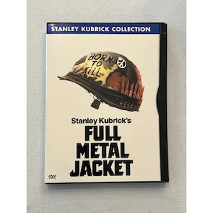 May include: DVD case for Stanley Kubrick's "Full Metal Jacket." The cover shows a military helmet with the words "Born to Kill" and a peace symbol. The film's title is in bold, white lettering.