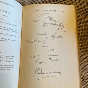 May include: Open book page featuring architectural plans of The Loretto Chapel. The page includes hand-drawn sketches labeled with letters and numbers, along with handwritten notes. The text includes the words "Remembrance" and "Chapel Plans."