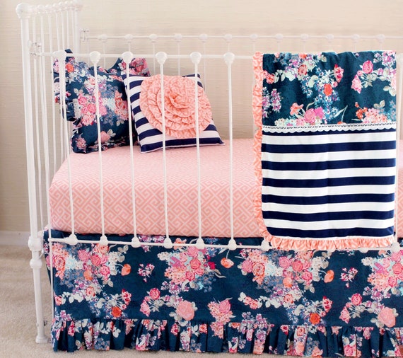 coral and navy nursery bedding