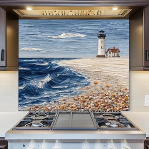 May include: A coastal-themed kitchen backsplash featuring an oil painting of a lighthouse on a sandy beach. The artwork depicts a blue ocean with white-capped waves, a white lighthouse, and a small red-roofed building. The beach is covered in small pebbles.