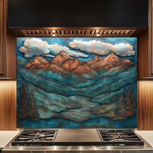 May include: A kitchen backsplash with a mountain scene. The relief artwork depicts mountains in copper and teal, with white clouds against a blue sky. The design includes a forest and a river. The backsplash is installed above a gas hob.