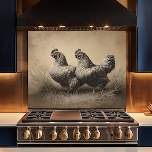 May include: A sepia-toned kitchen backsplash features a detailed illustration of two chickens standing in tall grass. The artwork is mounted above a stainless steel gas range with gold-colored knobs, set against a dark blue and gold-toned kitchen design.