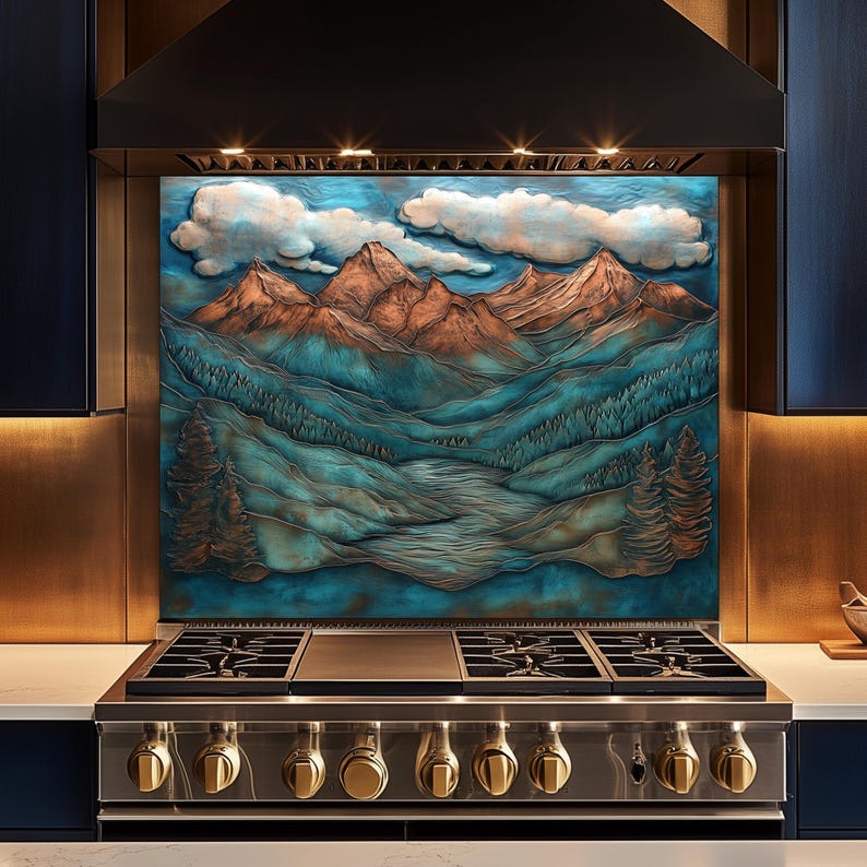 May include: A kitchen splashback with a mountain scene design. The artwork depicts brown mountain peaks, blue valleys, and white clouds. The splashback is above a stainless steel gas range with gold-coloured knobs.