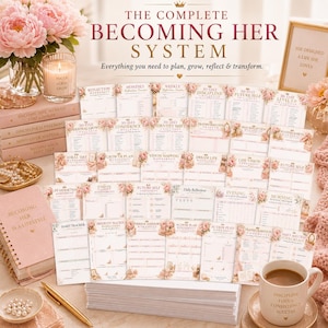 May include: The Complete Becoming Her System includes a collection of printed worksheets and planners featuring floral accents. Items include a spiral-bound notebook, a mug with the text Discipline, Consistency, Success, and various goal-tracking sheets.