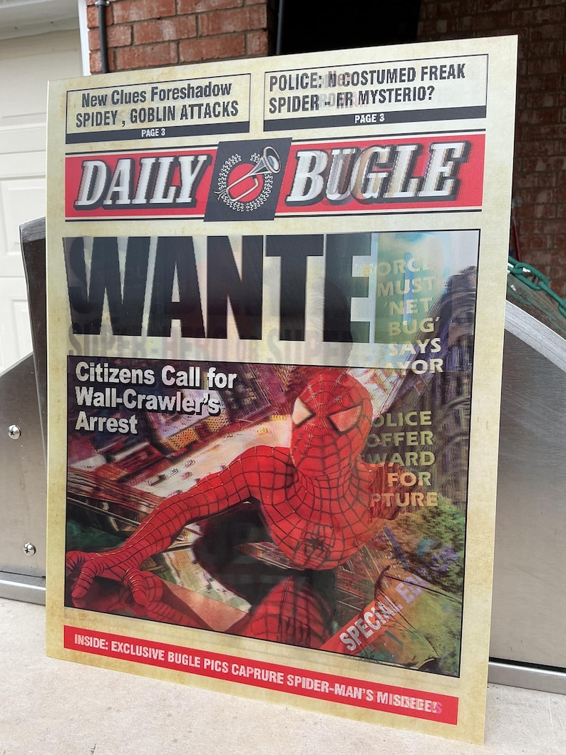 May include: A Daily Bugle newspaper poster with a vintage design. The headline reads "WANTED" with a picture of Spider-Man. Text includes "Citizens Call for Wall-Crawler's Arrest" and "Police Offer Reward for Capture."
