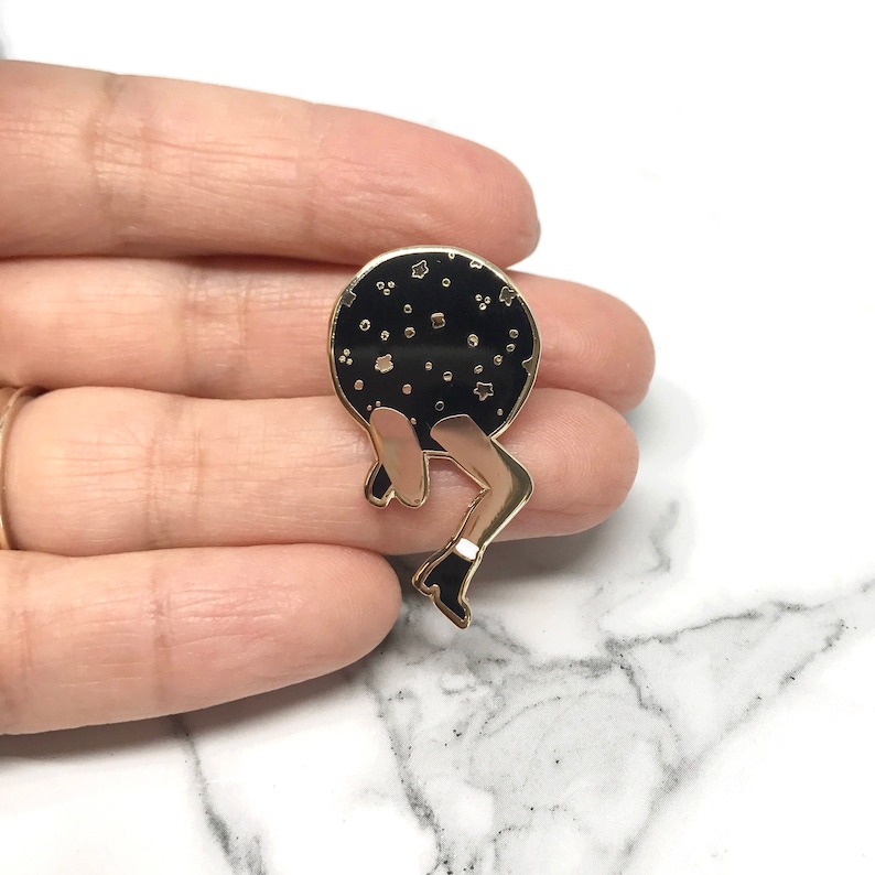 New Beginings Getting out of your space Space Legs Enamel Pin in Gold