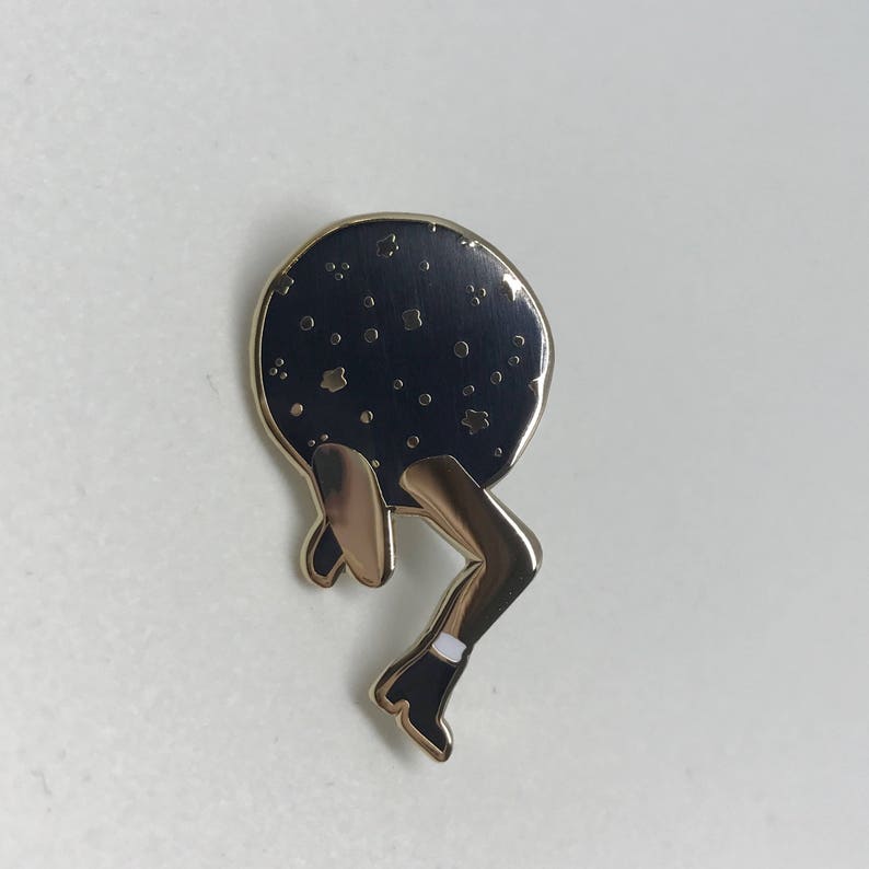 New Beginings Getting out of your space Space Legs Enamel Pin in Gold