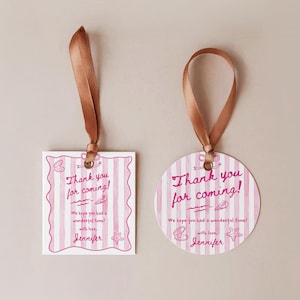 May include: Two gift tags with brown ribbon. One is square, the other is round. Both have pink and white stripes and the text "Thank you for coming!" with seashell and starfish illustrations. The tags are personalized with the name "Jennifer".