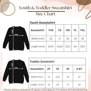 May include: A size chart for youth and toddler sweatshirts. The chart shows the width and length measurements in inches for various sizes, including YXS, YS, YM, YL, YXL, 2T, 3T, 4T, and 5-6T. The text also mentions a tolerance of up to 1 inch.