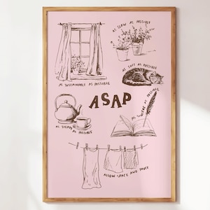 May include: A framed print with a pink background features brown line drawings of a window, plants, a cat, a teapot, a book, and clothes on a clothesline. The word "ASAP" is in the center, with phrases like "As slow as possible" and "Allow space and pause."