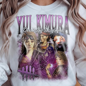 May include: White sweatshirt featuring a graphic of Yui Kimura from Dead by Daylight. The design includes multiple images of Yui, with purple and pink accents, and the game's logo. The text "Yui Kimura" and "Dead By Daylight" are visible.