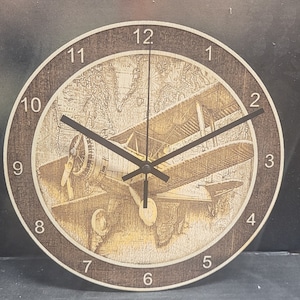 Reloj biplano con ilusión 3D