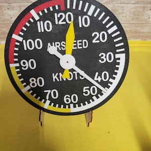 May include: A rustic wooden sign with the text "Welcome to our home" in white lettering. The sign features a distressed finish and a simple, inviting design, perfect for a front porch or entryway.