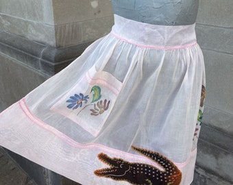 Altered Vintage 50s Mid Century Pink Organza Apron with Flowers and a Crocodile