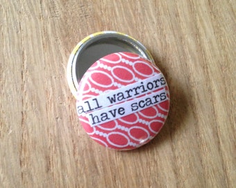 All Warriors Have Scars - Pinback Button, Magnet, Zipper Pull, Mirror, or Bottle Opener