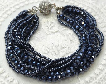 Multi strand beaded bracelet in beautiful midnight blue with crystal ball magnetic clasp