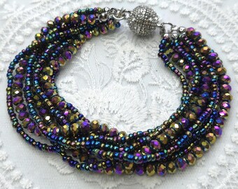 Multi strand beaded bracelet in stunning aurora borealis beads with crystal ball magnetic clasp