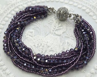 Multi strand beaded bracelet in beautiful amethyst purple with crystal ball magnetic clasp