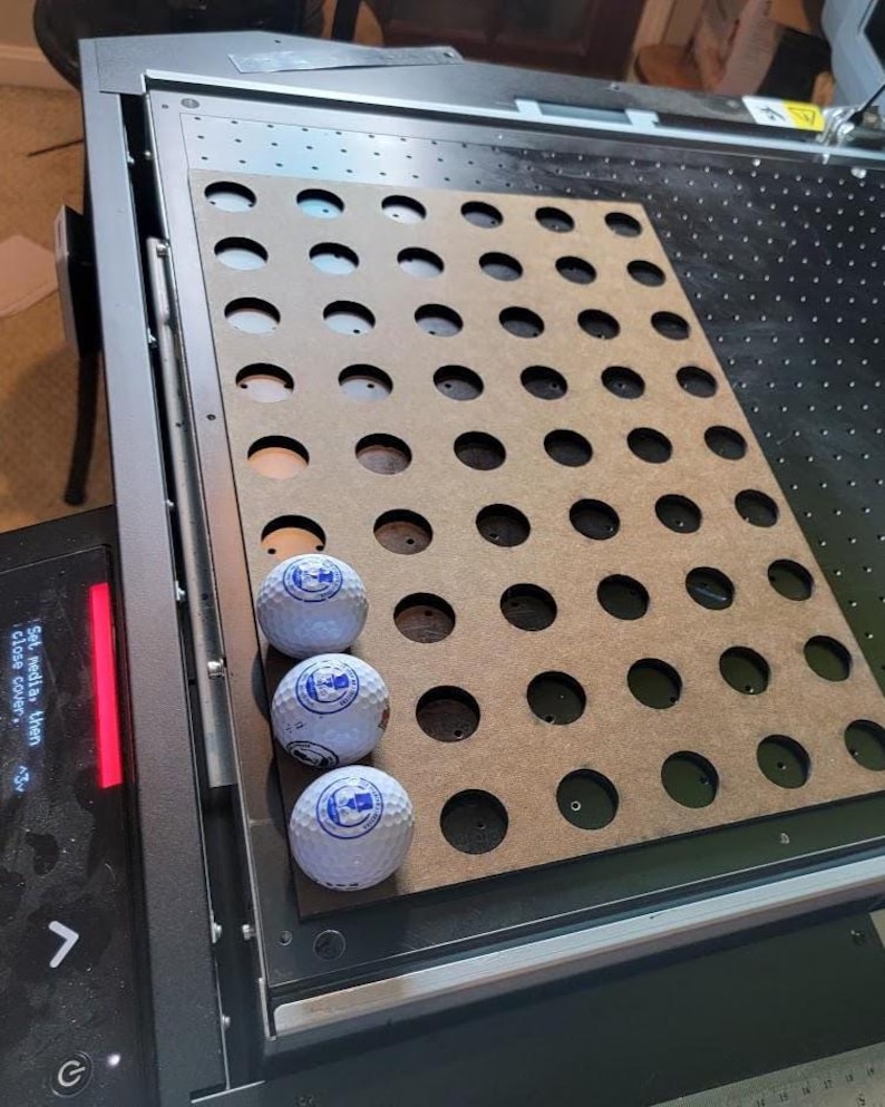 54-Ball Golf Ball Printing Template – Digital Alignment Jig for UV Flatbed & Professional Printers

Description: Maximized production. Zero alignment errors. This digital jig template is engineered for high-volume golf ball customization, allowing you to print up to 4.5 dozen (54 balls) in a single pass.

Designed for professional-grade efficiency, this file eliminates the frustration of manual placement and ensures your logos are perfectly centered every time.