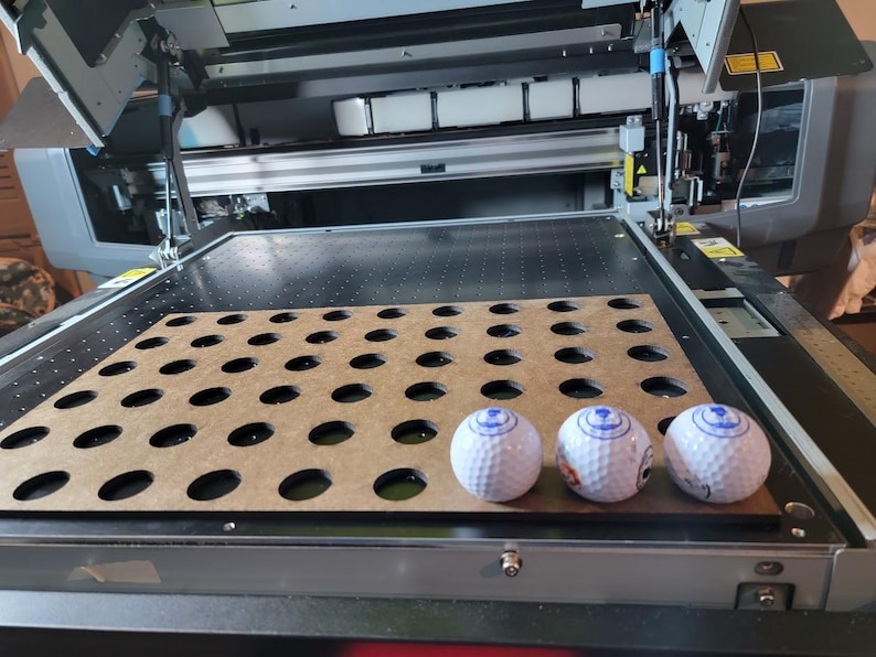 Printable Golf Ball Design File for Laser or Inkjet Printers--This digital file allows you to print custom designs on golf balls using either a laser or inkjet printer. Designed for efficiency and precision, it enables you to print on up to 4.5 dozen golf balls (54 balls) at a time, making mass customization quick and easy.
Features include:
Precisely stepped registration marks for accurate placement on each ball.
PIN bar registration system to ensure consistent alignment across multiple prints.
