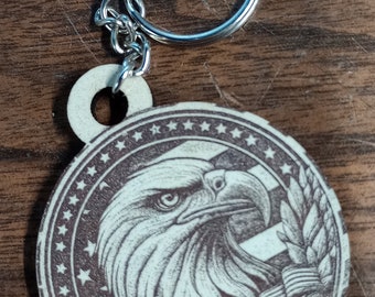 Great Patriotic keychains with Eagle and American flag designs, these wooden pendants add a touch of American Class with an Eagle to boot.