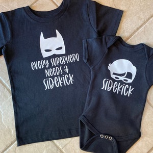 Every Superhero Needs a Sidekick - Birth Annoucment - Sibling Shirts