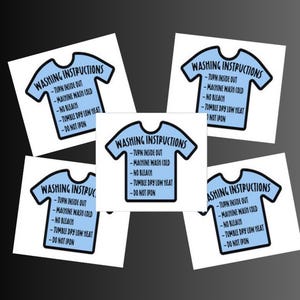 May include: Five white square labels with blue and black text that reads "Washing Instructions" with a blue silhouette of a t-shirt. The instructions are: Turn inside out, Machine wash cold, No bleach, Tumble dry low heat, Do not iron.