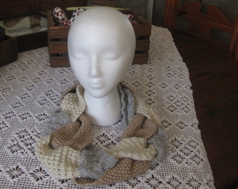 Hand knitted braided cowl in grey, beige, and tan acrylic yarn 6 inches wide and 42  inches in circumference