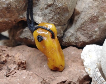 Unique handmade Baltic amber pendant with two natural holes (hagstone), 100% natural, like a crocodile or pirate --- free worldwide shipping