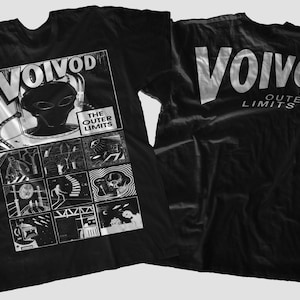 May include: Black t-shirt with a white graphic print of a band logo, "Voivod", and the text "The Outer Limits". The back of the shirt has the band name "Voivod" printed in white.
