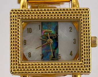 Faberge Ladies Gold Tone Quartz Bracelet Watch w Mother of Pearl Abalone Dial c 1990s