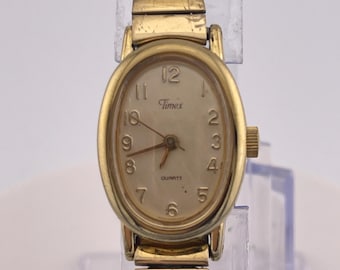 Timex Cavatina Ladies Quartz Gold-Tone Oval Watch Champagne Dial- Expandable Band (c.1990s)