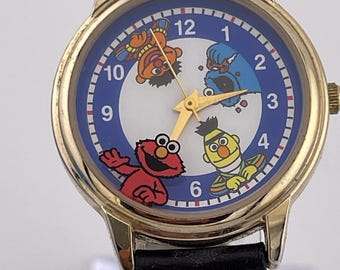 Fantasma Sesame Street Elmo & Friends Quartz Watch c. 1990s Gold Tone Case Character Dial with Box