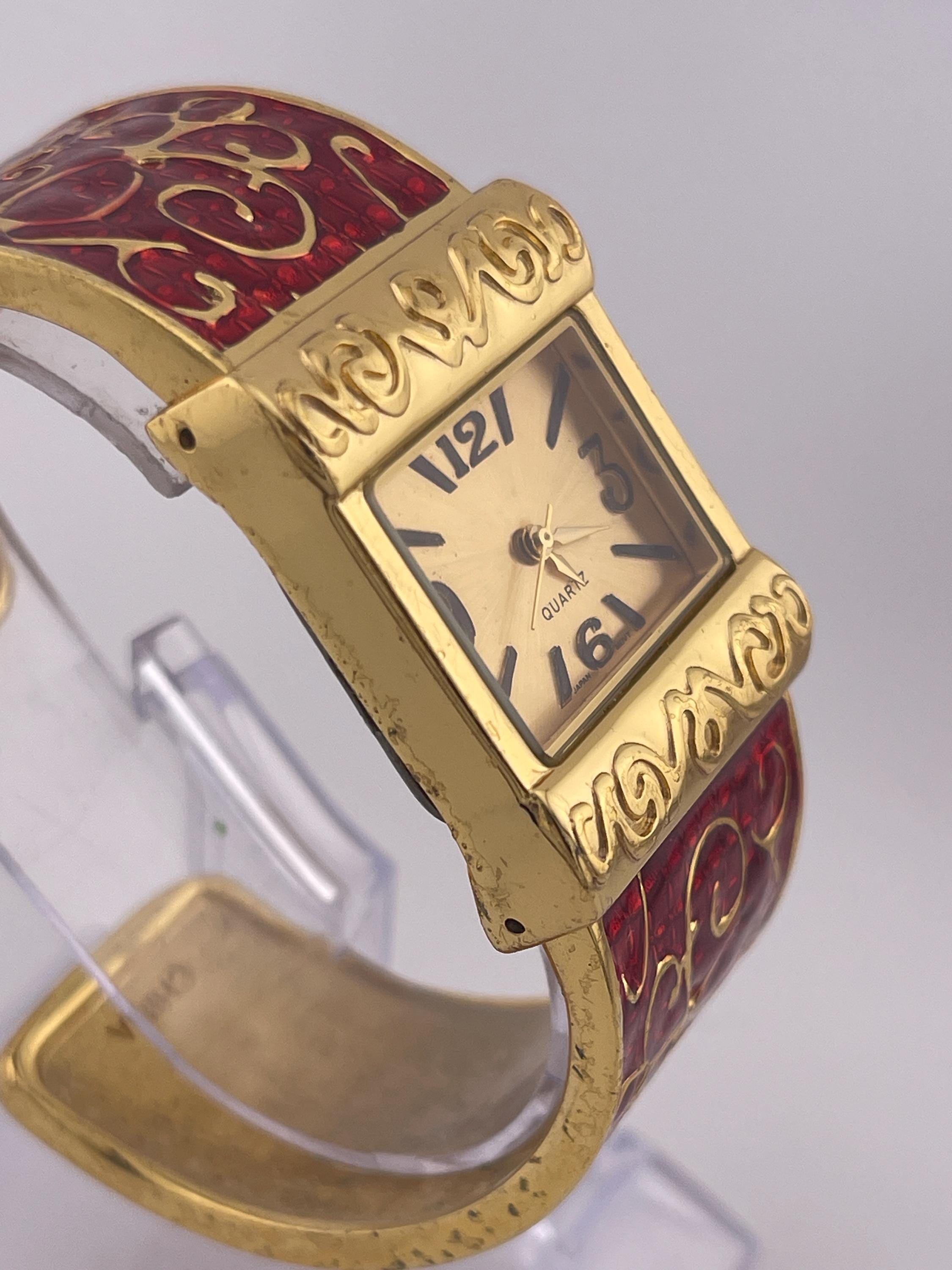 Avon Gold Tone and Red Enamel Scroll Design Hinge Cuff Watch Avon Gold-tone & Red Enamel Scroll Hinge Cuff Watch (c.1990s  main image 3