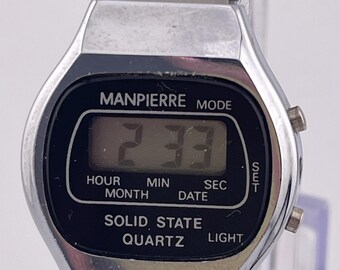Montre numérique à quartz numérique argentée Manpierre (vers les années 1980) - Montre d'occasion rétro vintage