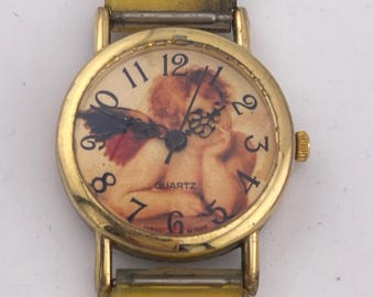 Seiko SII Raphael Cherub Gold Watch - Etsy display picture 1