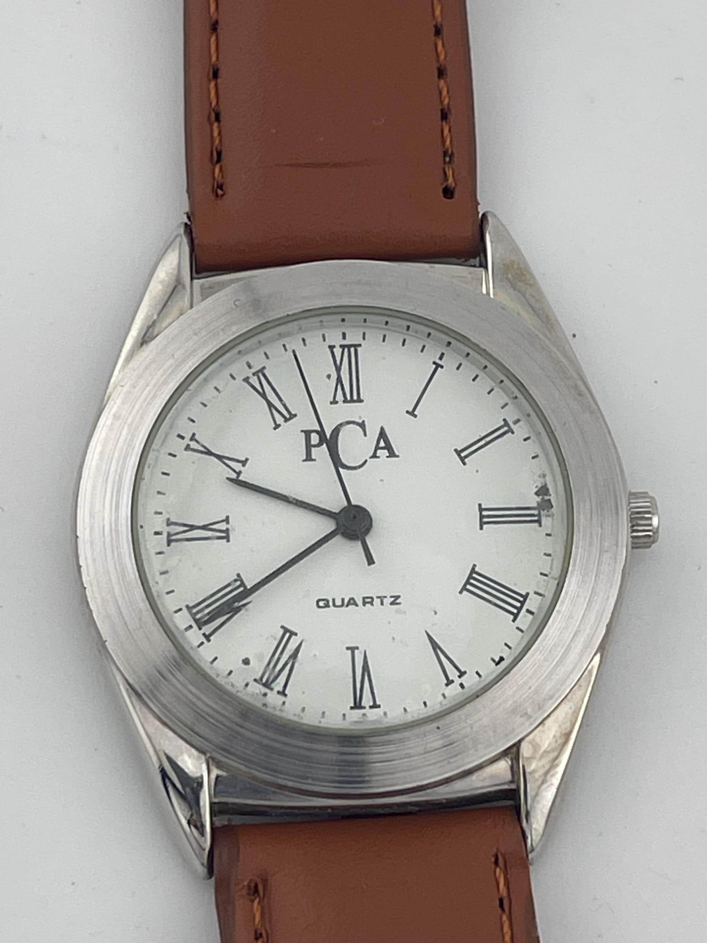 Vintage PCA Quartz Uhr 17353/04/06 Singapore Mov't, römische