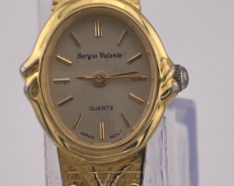 Vintage Sergio Valente Women's Gold Tone Quartz Watch Oval Dial Self-Adjusting Band (c.2000s) – Pre-Owned Timepiece
