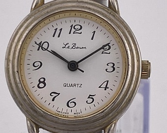 Reloj vintage Le Baron de cuarzo para mujer, correa de expansión en tono dorado, década de 1990