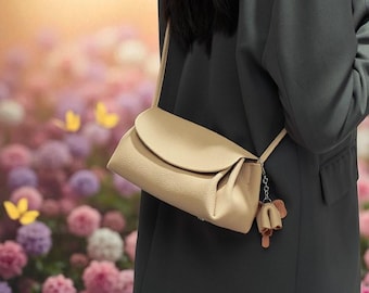 スラウチバッグ。キャメルブラウンのトートレザーバッグ。タバコ