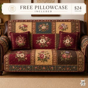 May include: A quilted sofa cover featuring a patchwork design of floral patterns in shades of burgundy, cream, and dark green. The cover includes two matching square throw pillows with floral embroidery, all displayed on a dark brown leather sofa.