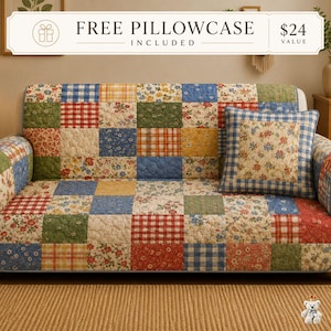 May include: A quilted sofa cover featuring a patchwork design of various floral, plaid, and gingham patterns in shades of blue, red, yellow, and green. A matching square throw pillow with a floral center and blue gingham border sits on the sofa.