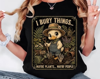 アヒルシャツ、私は物を埋めます。植物かもしれないし、人かもしれない。ガーデニングTシャツ