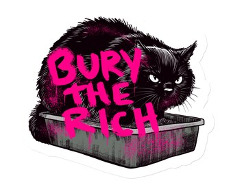 May include: A black cat with angry eyes sits in a litter box with the words "BURY THE RICH" written in pink spray paint.