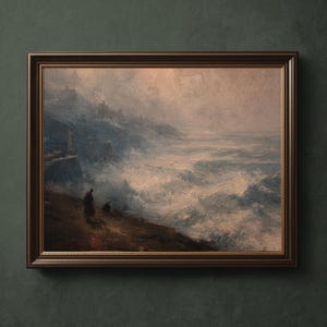 May include: A framed landscape painting depicts a coastal scene with a stormy sea. The artwork features a dark brown frame and a palette of blues, grays, and hints of pink. Figures stand on a cliff overlooking the turbulent waves, with buildings in the distance.