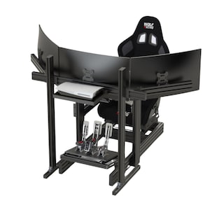 May include: A black racing simulator setup with three curved monitors, a racing seat, and a pedal system. The monitors are mounted on a black frame. The racing seat has the text "WOLF RACING" on the headrest.