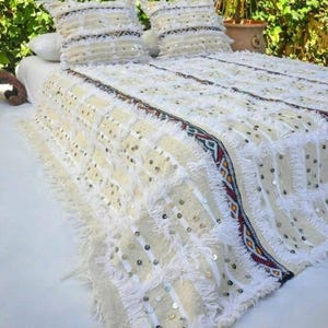 May include: A rustic wooden sign with the text "Welcome to our home" in white lettering. The sign features a distressed finish and a simple, inviting design, perfect for a front porch or entryway.