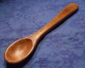 Hand carved long baby spoon in cherry wood