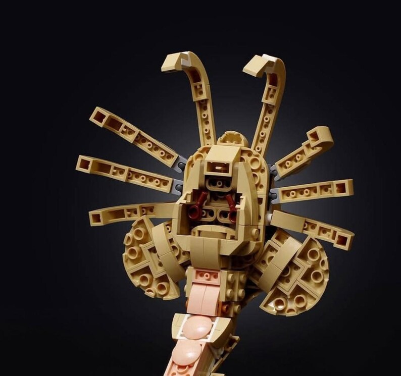 PDF. step by step instructions to build a Lego-Facehugger build from set #31162